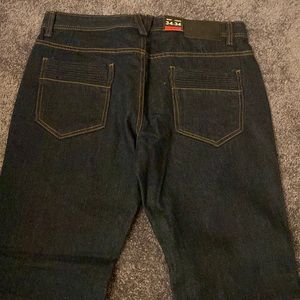 Men’s simple biker jean, ribbed design on back pockets. Brand new w/tags.